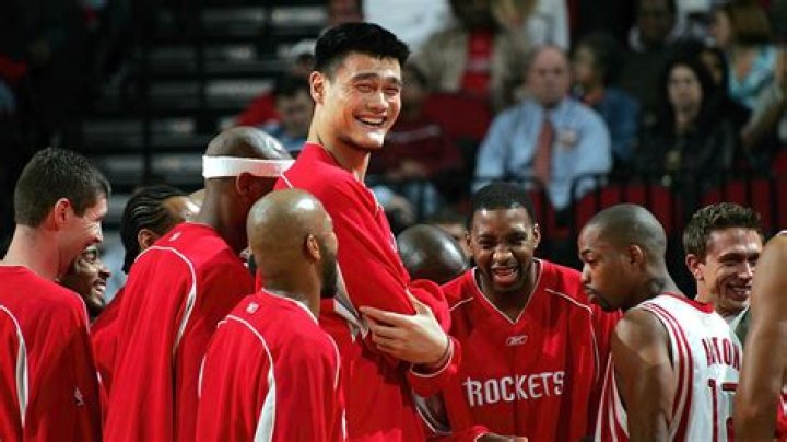 15-Across's NBA team for which Yao Ming played