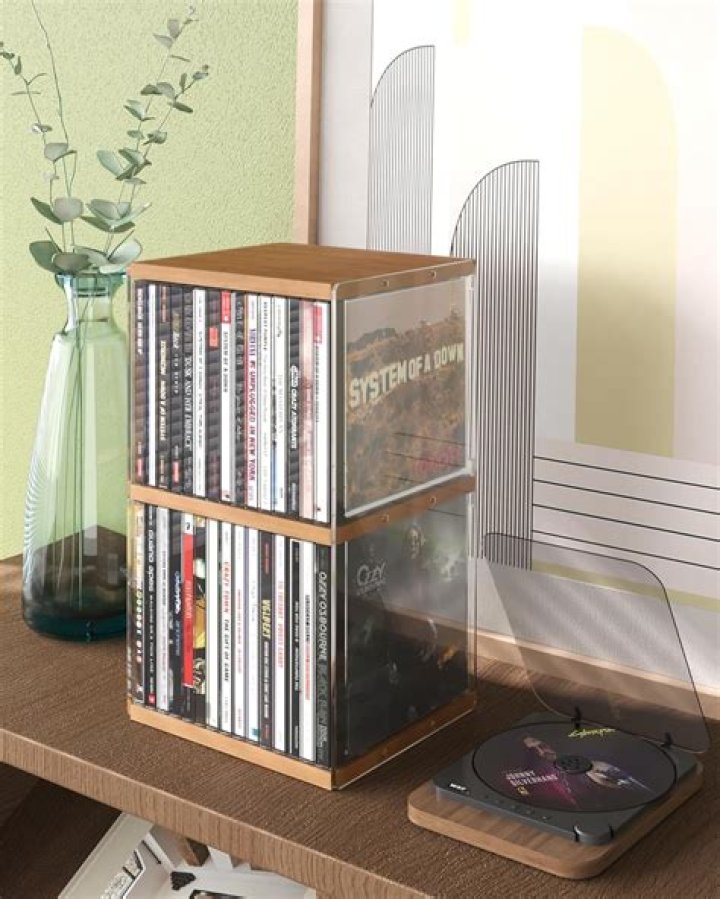 1990s music holders: Abbr.