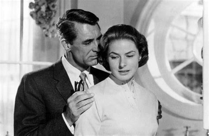 Kiss and ___ (be indiscreet)