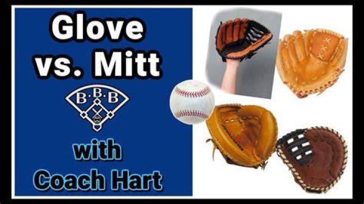 Part of a baseball mitt between the fingers and thumb