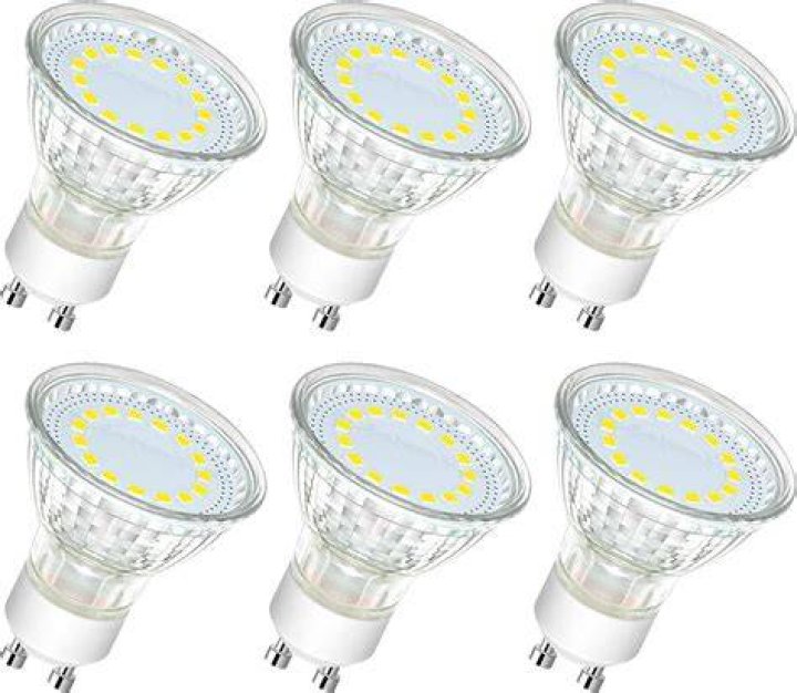 Reduce as a light bulb's brightness