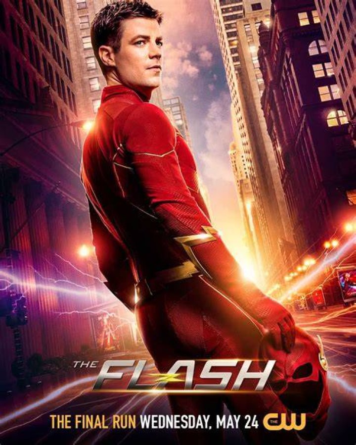 With 31-Across real name of The Flash played by Grant Gustin on the CW's The Flash